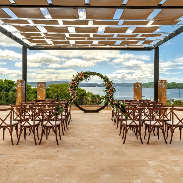 Scenic waterfront wedding ceremony setup at one of Costa Rica's top destination wedding venues.