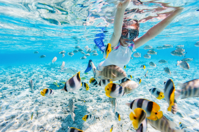 Small destination wedding ideas like snorkeling are a great way to offset small budgets