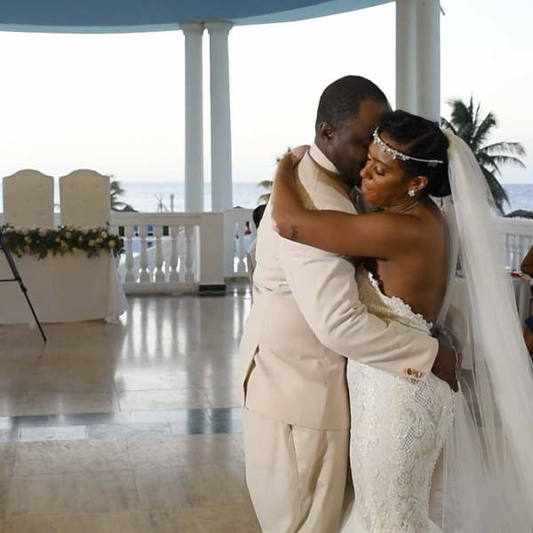 Gorgeous couple embraces in their first dance at the Lagoon room at Grand Palladium Jamaica