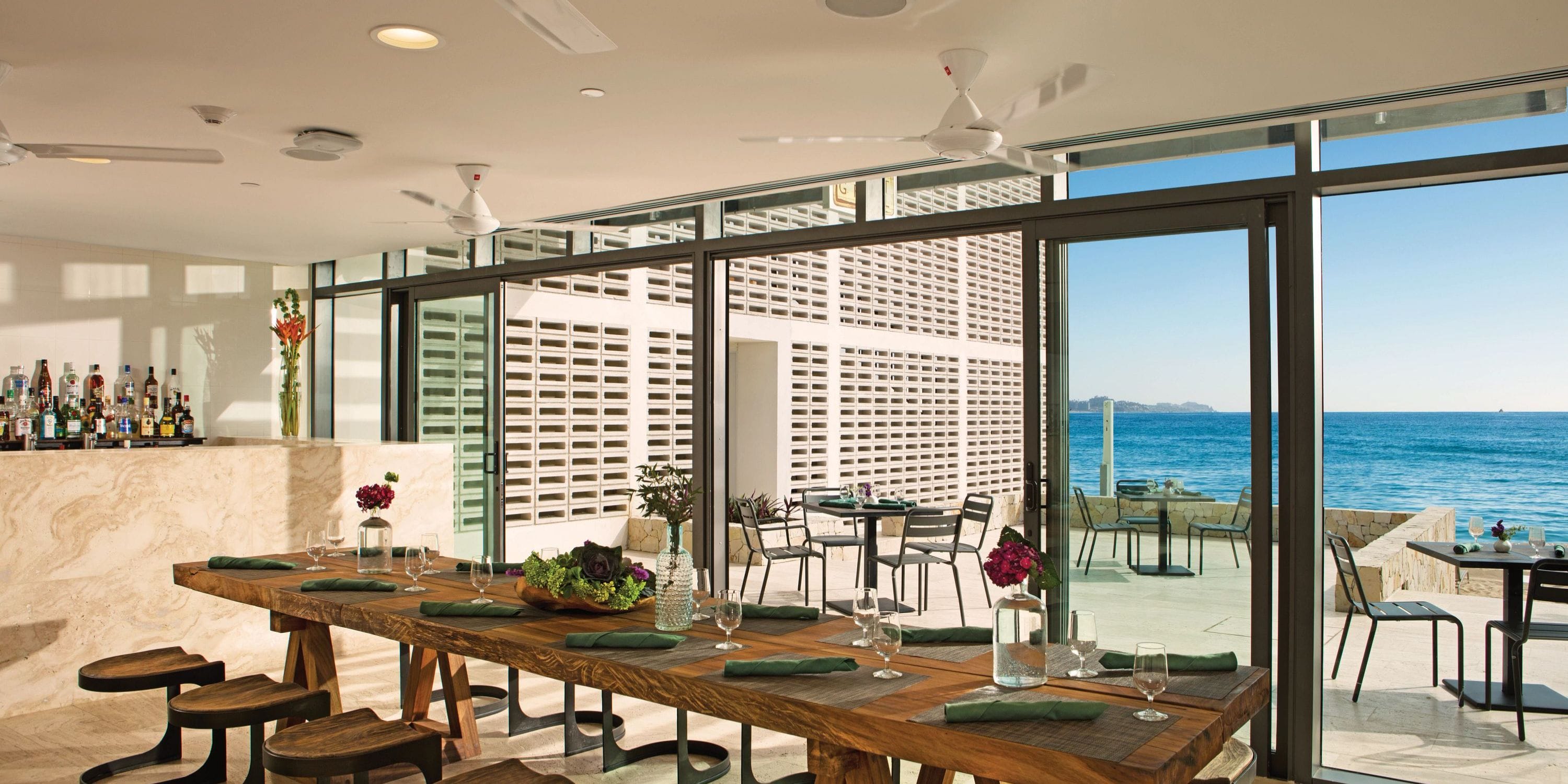 Breathless Cabo San Lucas: chic beachside dining, perfect for a wedding with ocean views.