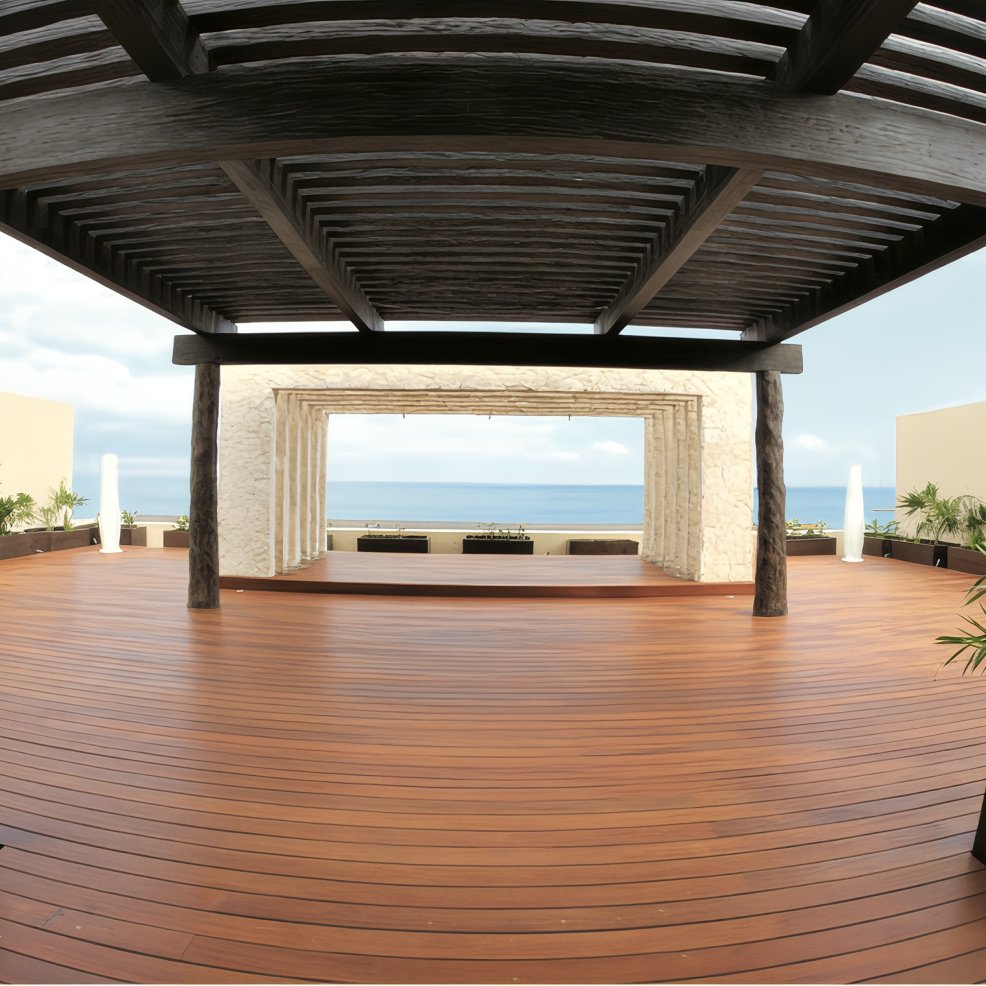 Wooden terrace with pergola and open stone frame, perfect for a destination wedding by the ocean.