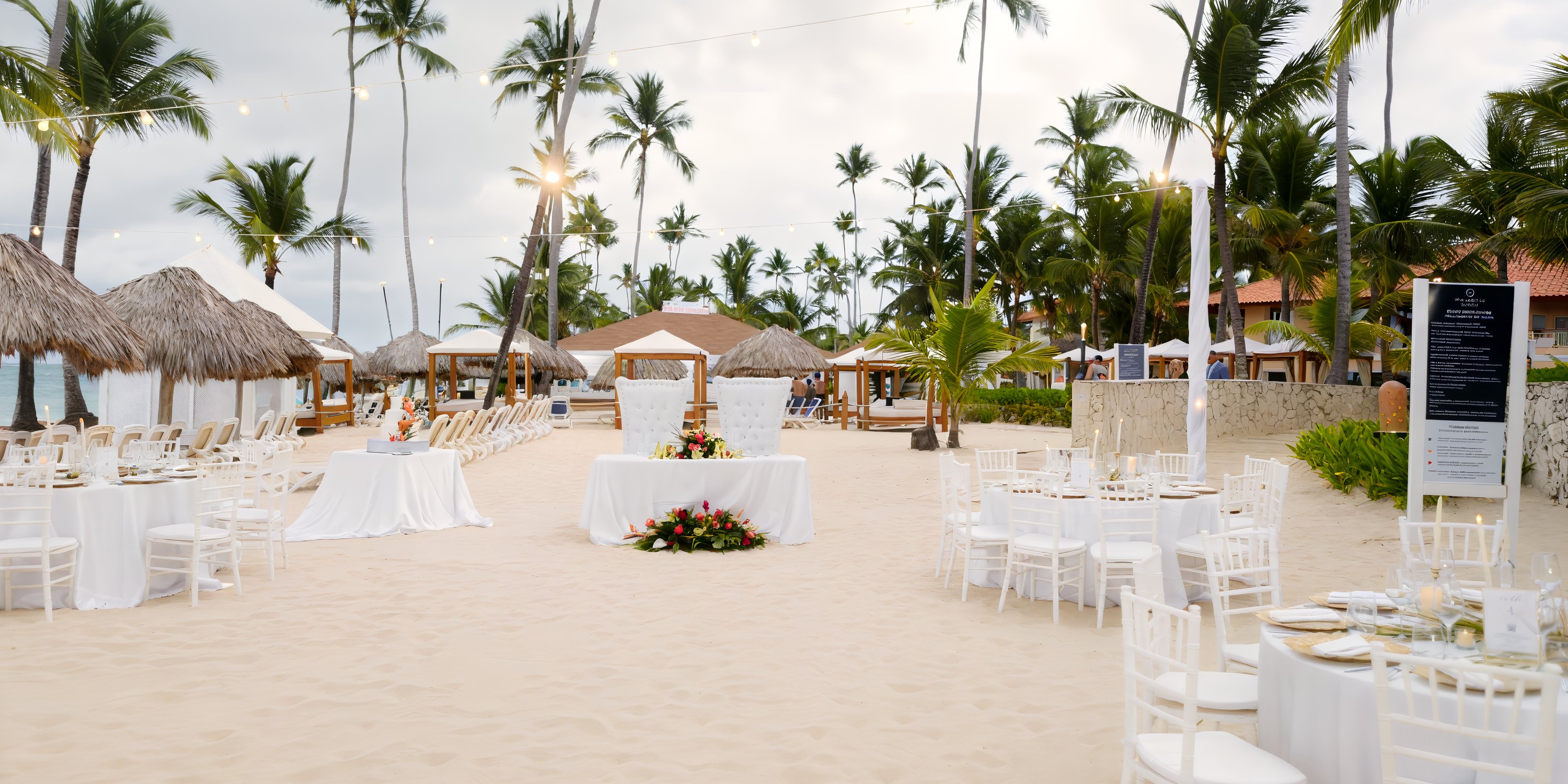 Majestic Elegance Punta Cana arranged for a destination wedding with white tables and floral decorations.