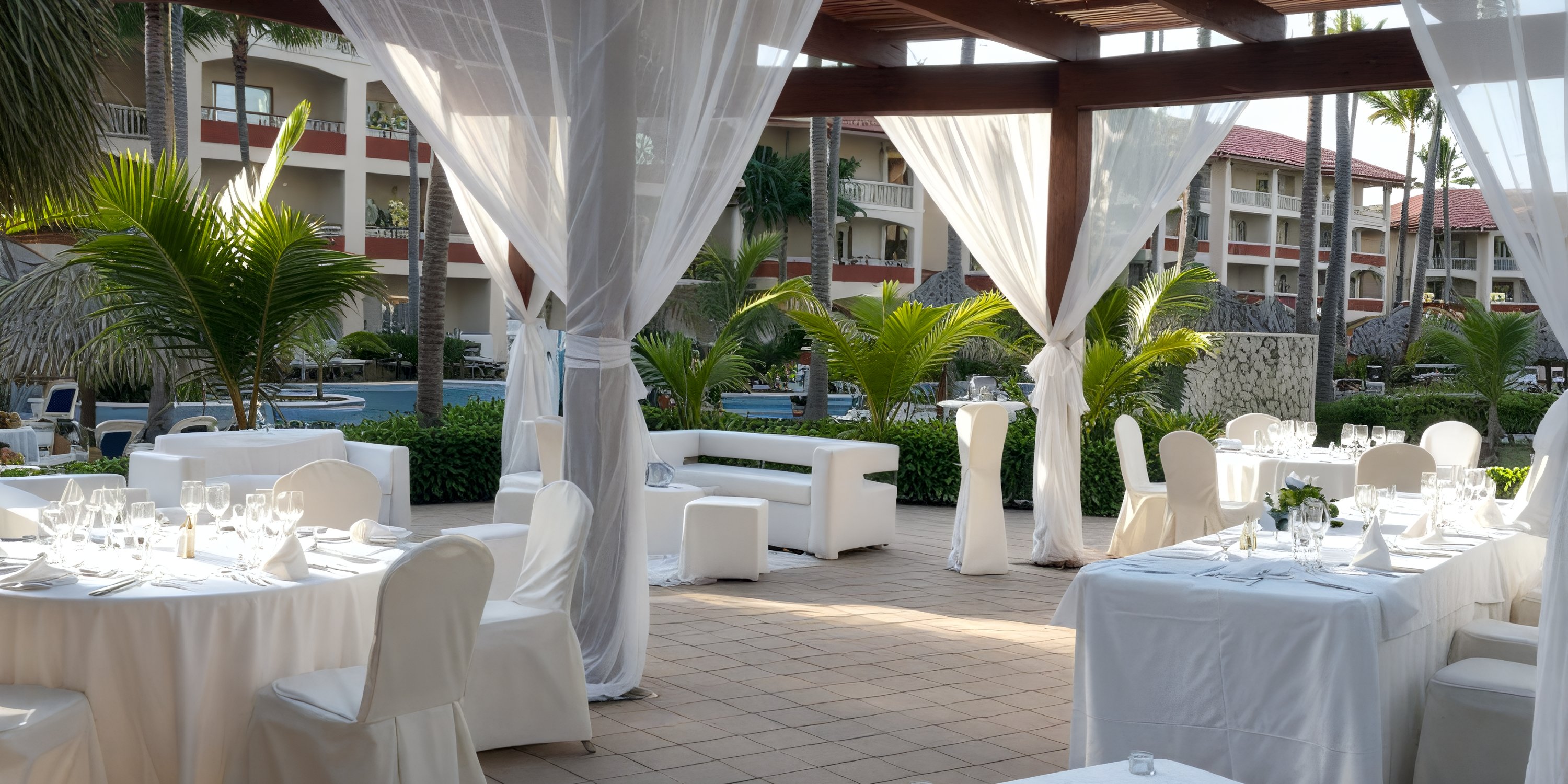 Poolside outdoor dining ideal for destination weddings and celebrations at the Majestic Colonial.