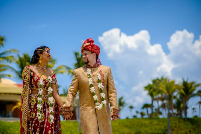 how to plan an indian destination wedding barcelo maya grand couple