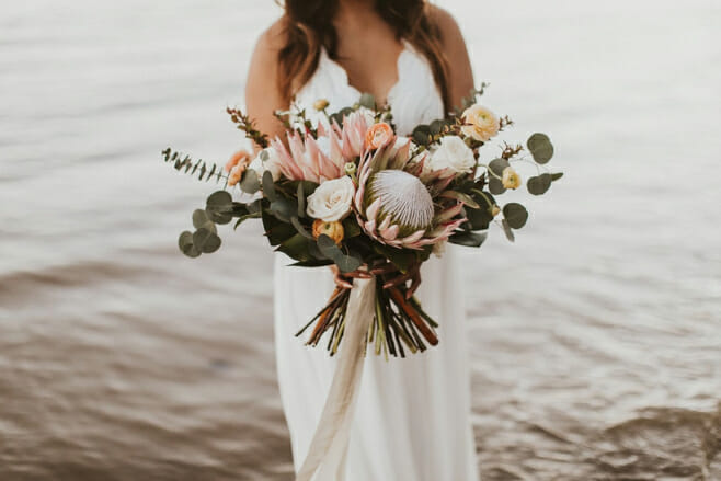 8 spring wedding bouquets that'll dazzle the beach aisle destination weddings boho bouquet