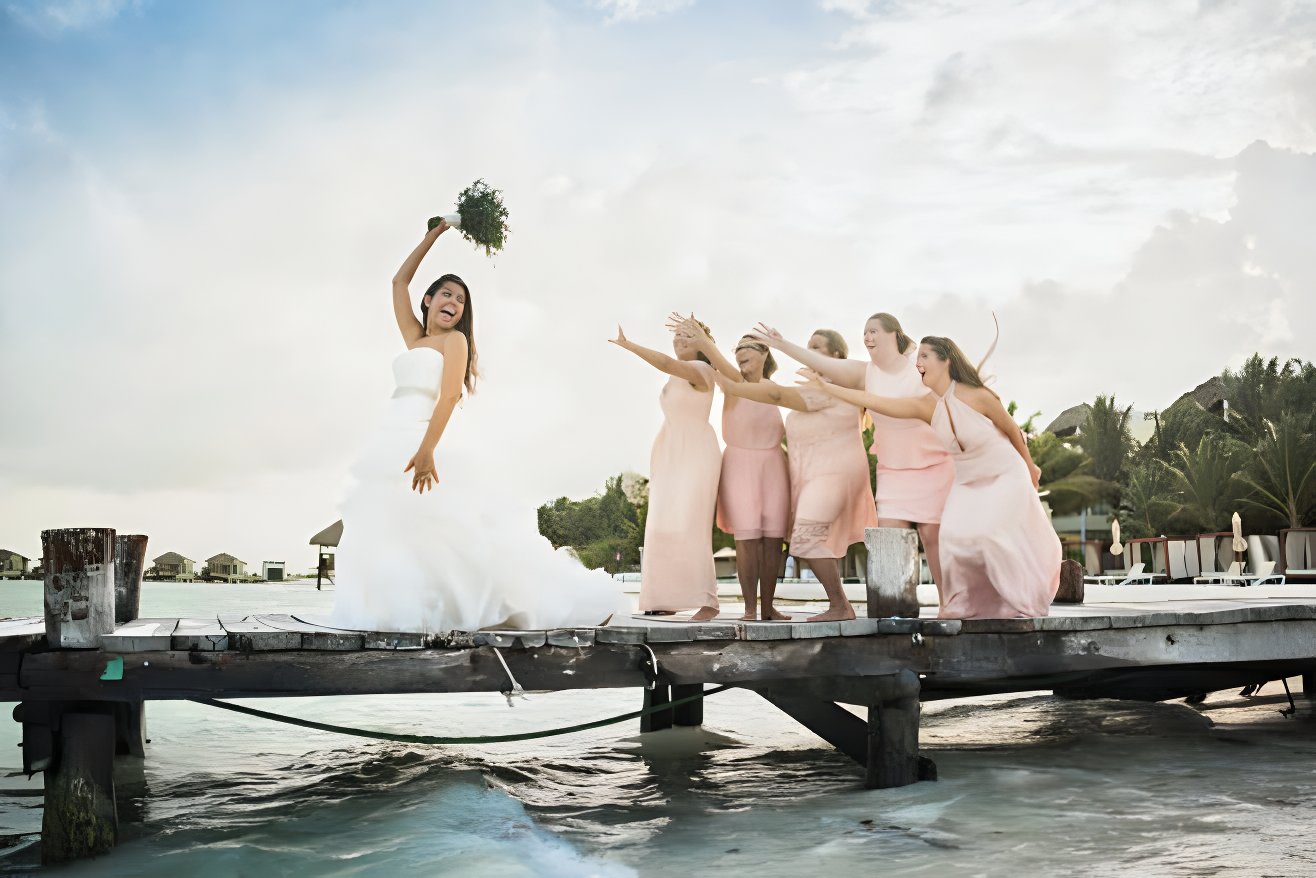 ways to make destination weddings more gender inclusive riviera maya mexico bouquet toss