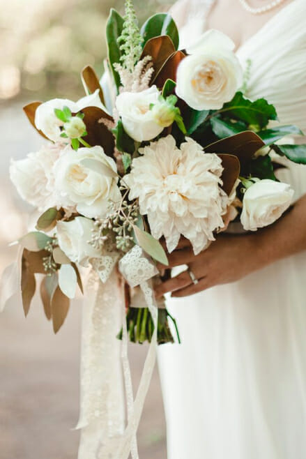 fall destination wedding floral designs dahlia bouquet with dried leaves inspiration