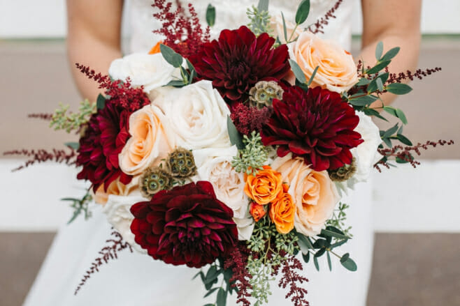 fall wedding trends you can take to the beach destination weddings dahlia flower arrangement