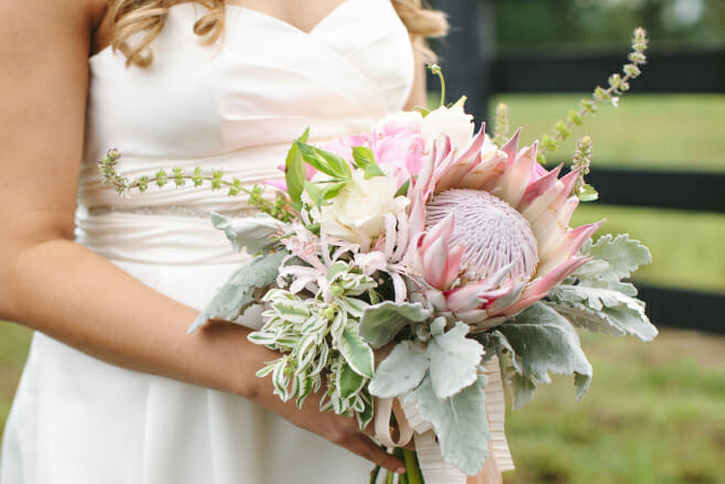 fall destination wedding floral designs king protea bouquet autumn trends