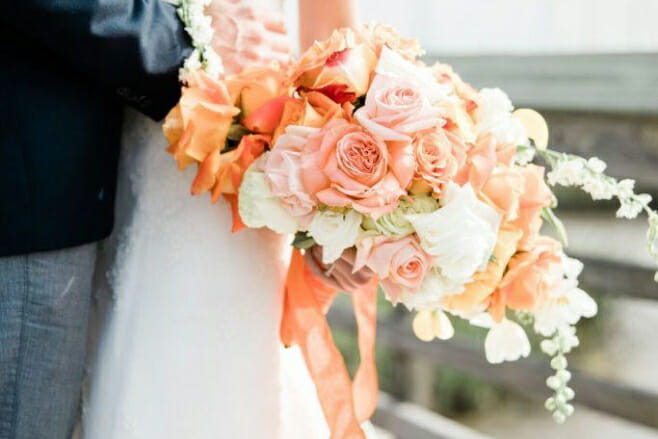 8 spring wedding bouquets that'll dazzle the beach aisle destination weddings orange pastel bouquet