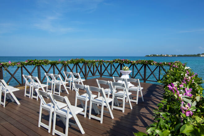 hosting a mini wedding in the mexico-caribbean in 2022 destination weddings royalton negril ocean pier