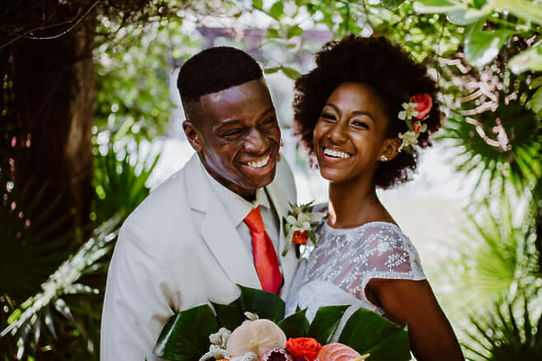 happy couple at tropical destination wedding