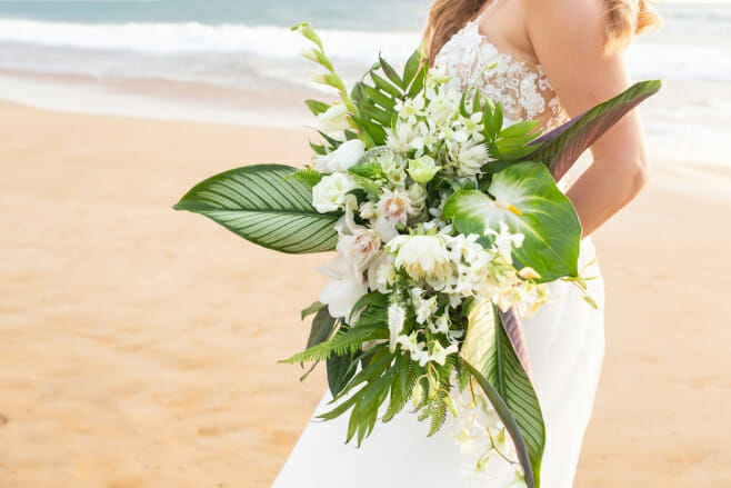 8 spring wedding bouquets that'll dazzle the beach aisle destination weddings tropical greenery bouquet