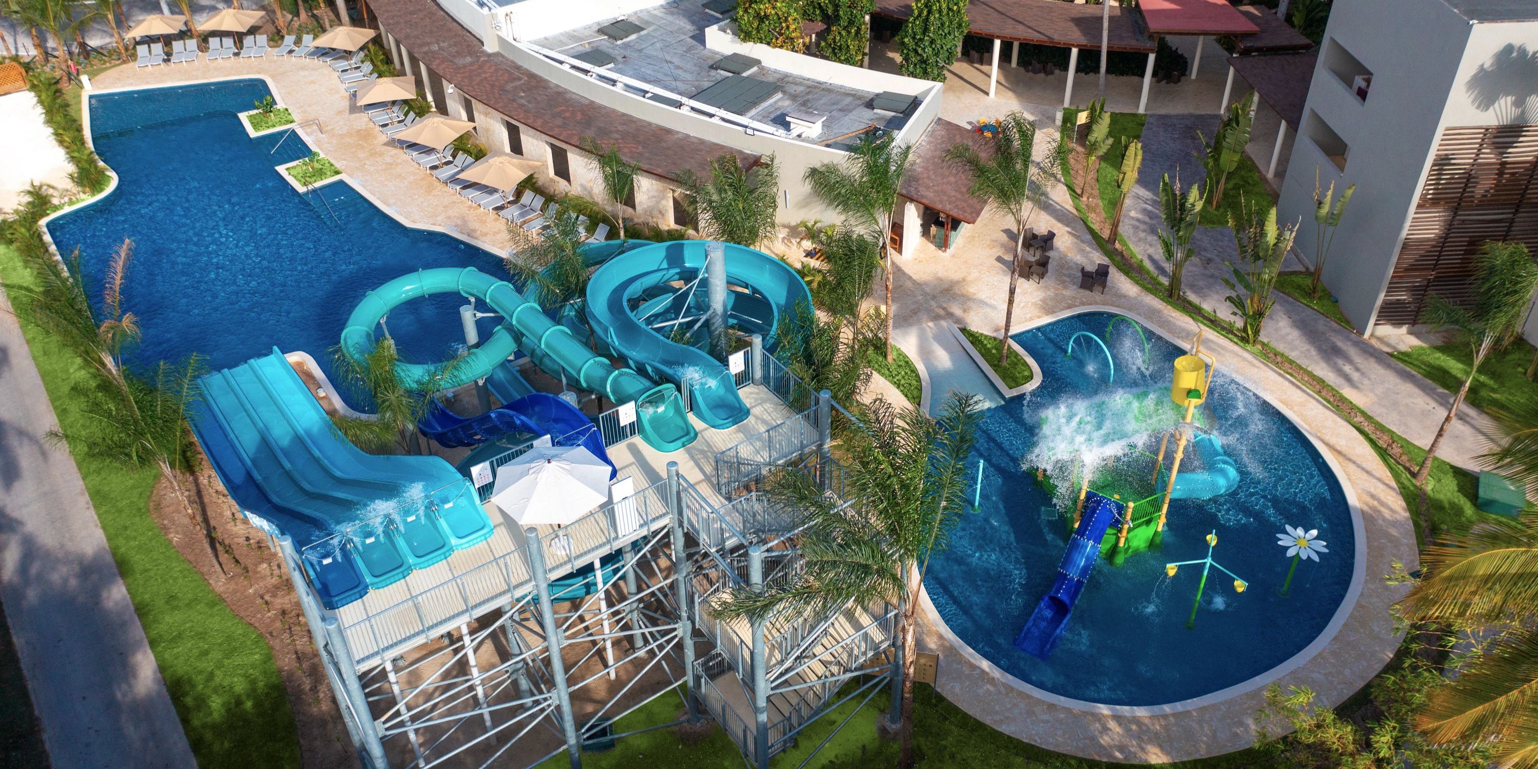 Aerial view of Dreams Royal Beach Punta Cana, perfect for a destination wedding, with pool and slides.