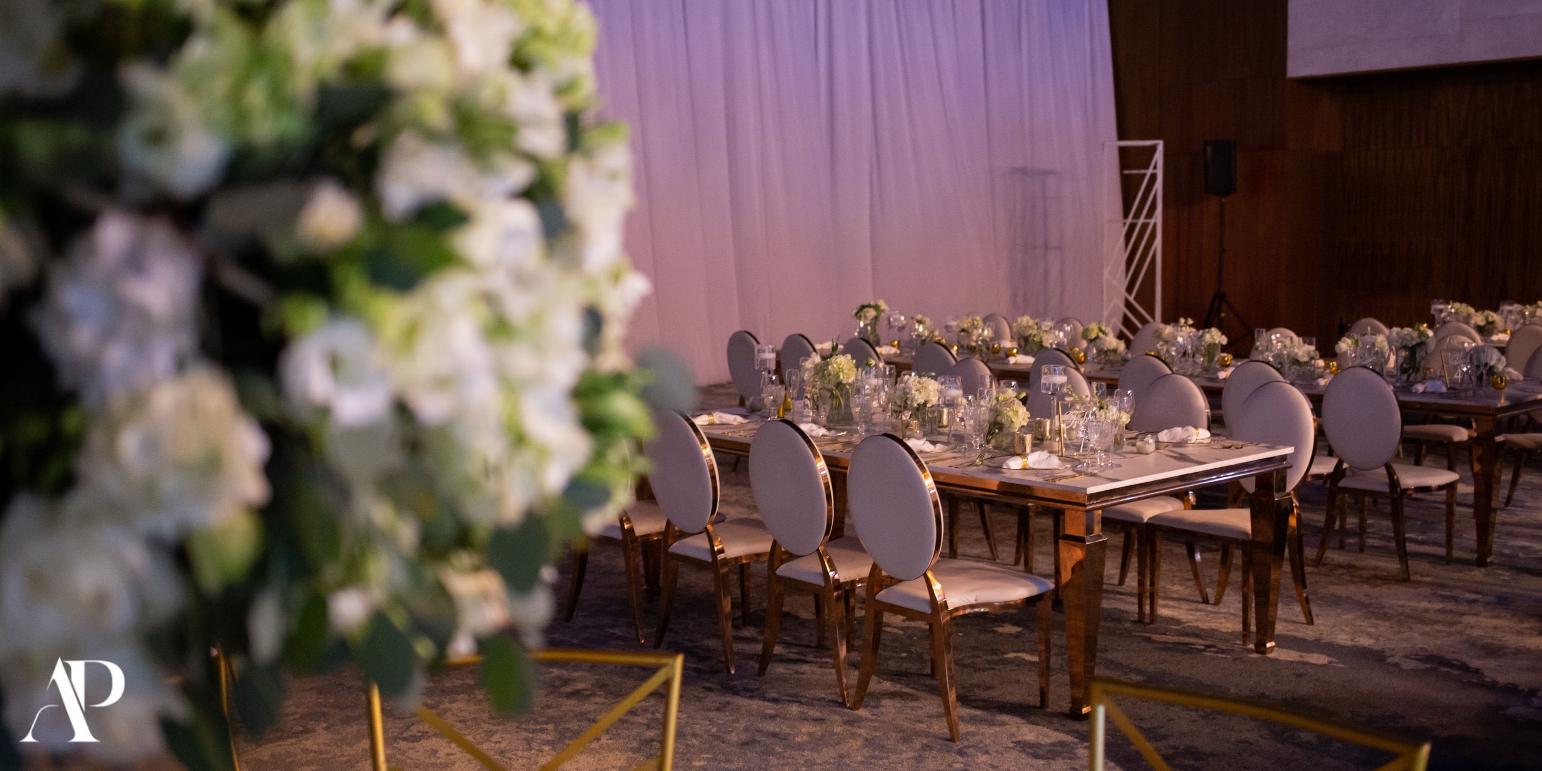 Dreams Bahia Mita offers a stunning destination wedding setup with banquet tables, white chairs, and flowers.