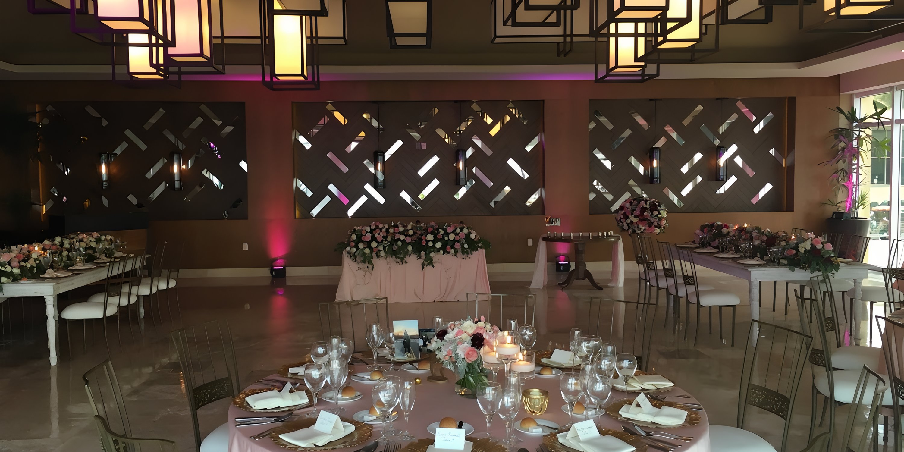 Dreams Jade Riviera Cancun banquet hall elegantly arranged for a modern destination wedding event.
