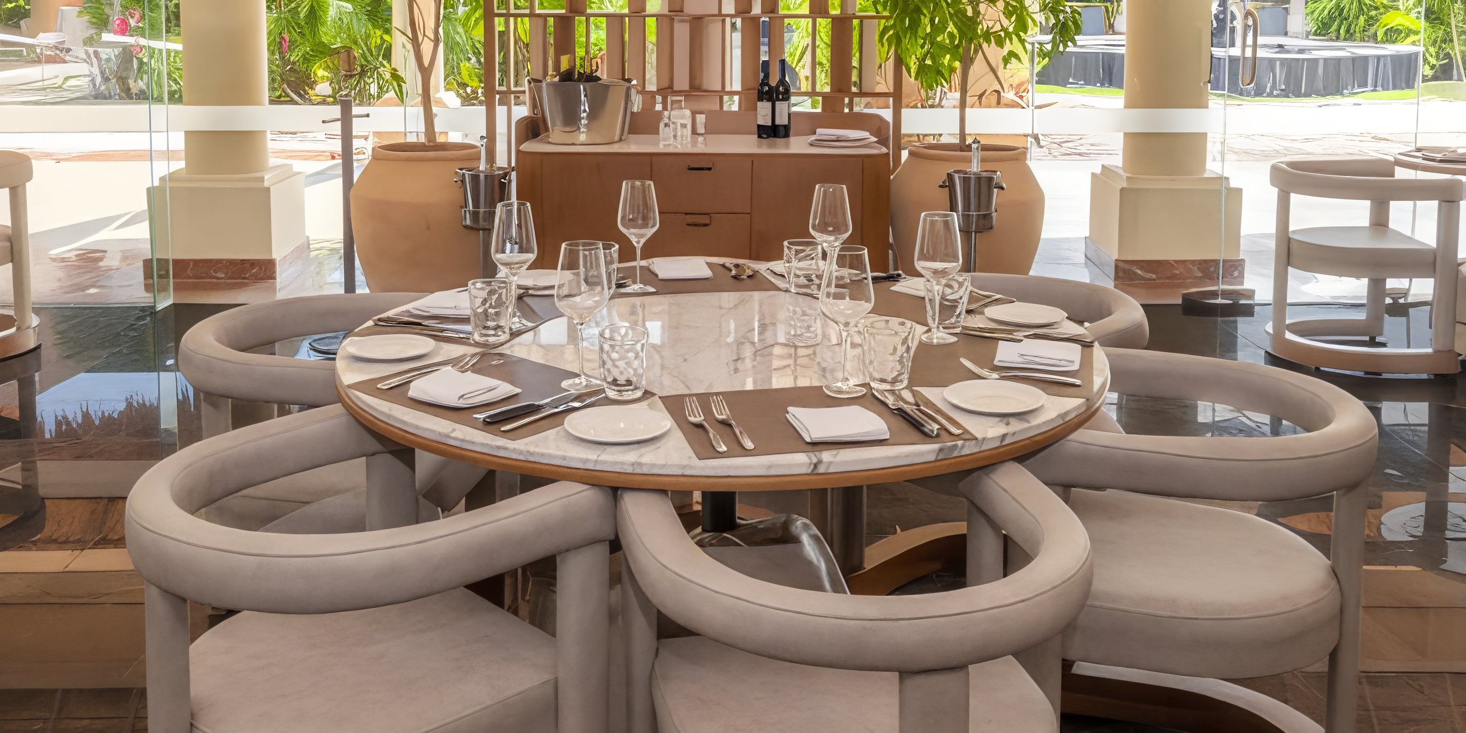 Grand Palladium Colonial dining set for six, modern chairs and glassware for a destination wedding.