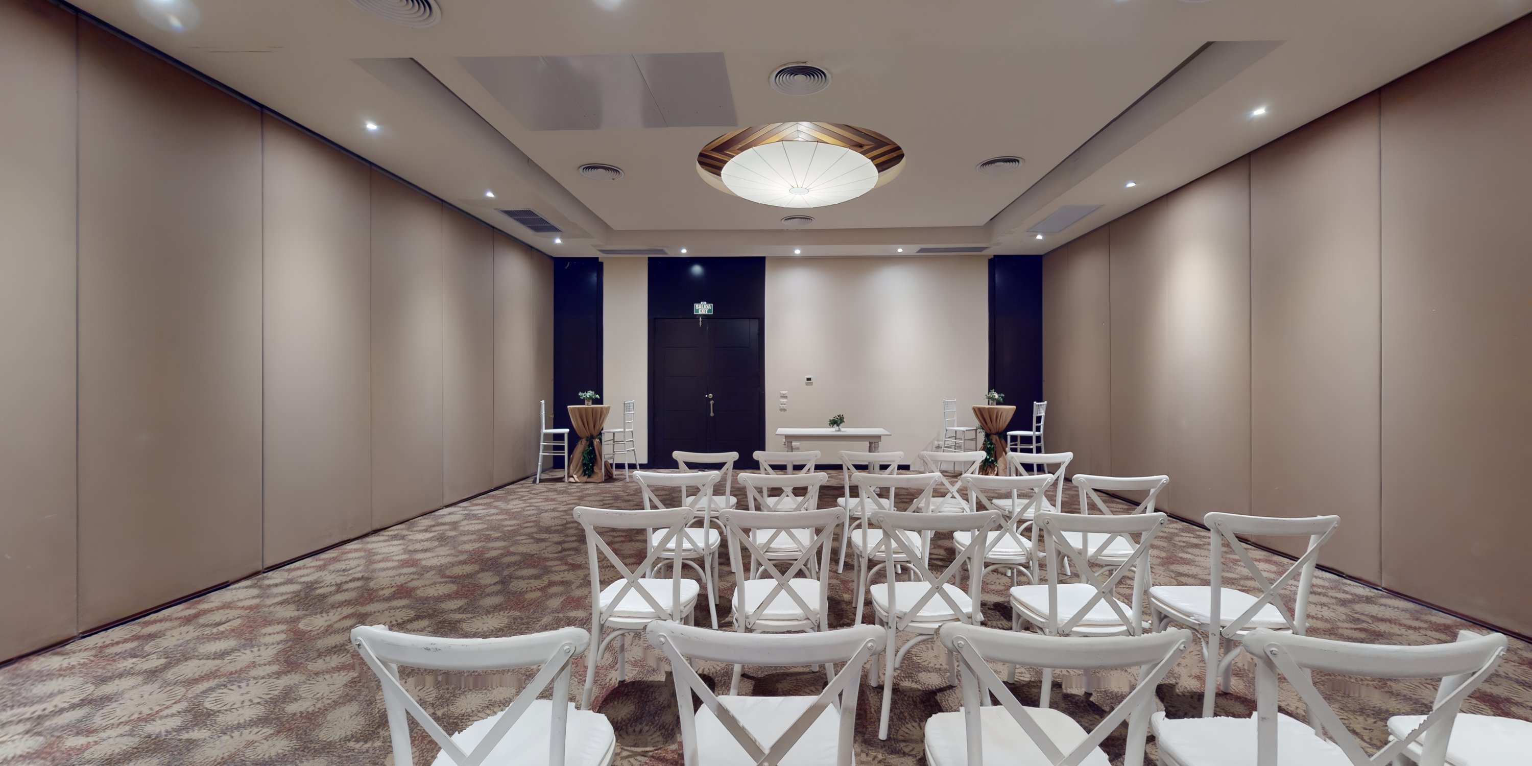 Intimate conference room at Hideaway at Royalton Punta Cana, set for a destination wedding ceremony.