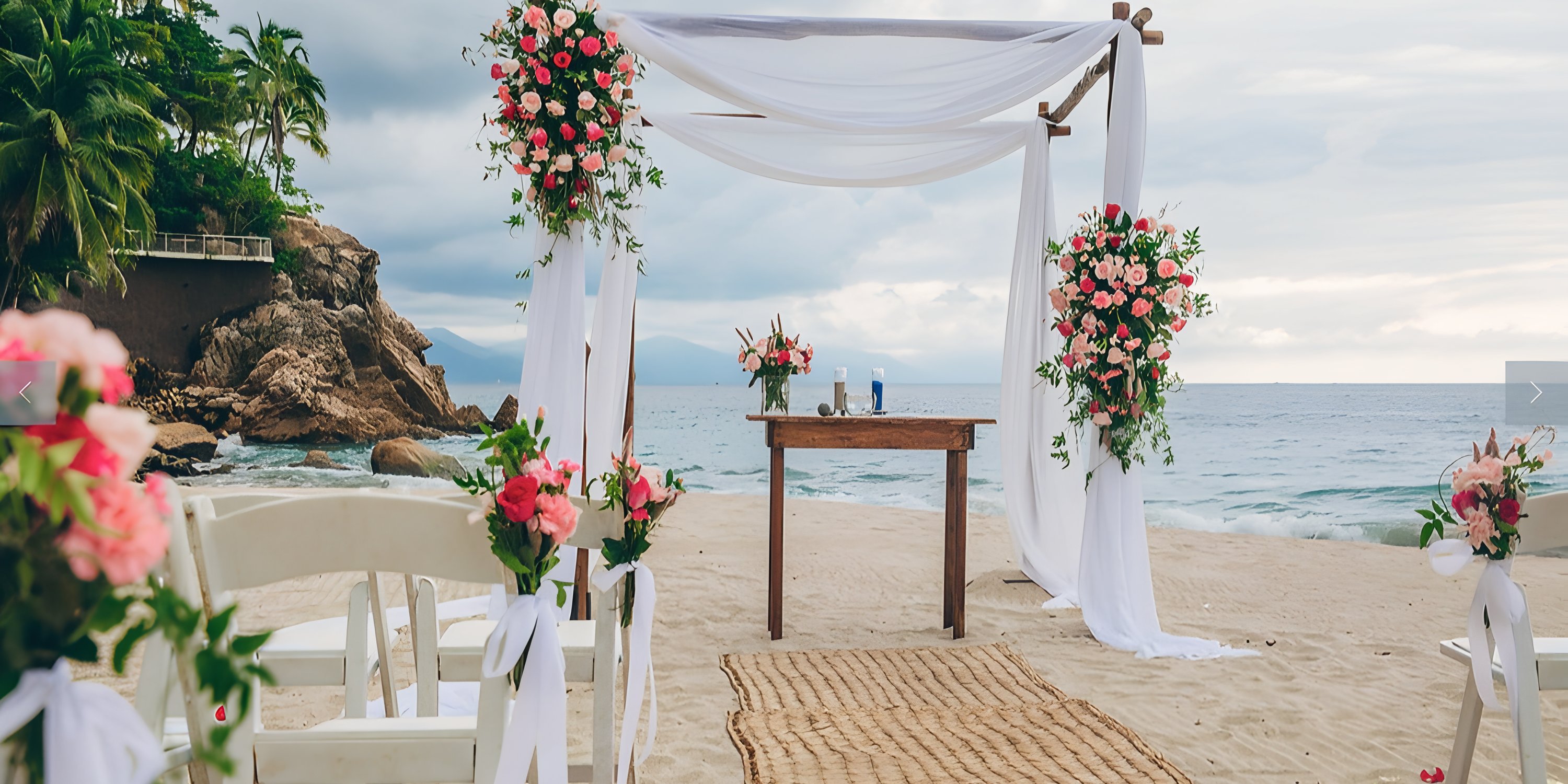 A destination wedding altar at Hyatt Ziva Puerto Vallarta, adorned with flowers and chairs by the ocean.