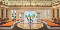 Hyatt Zilara Cancun&rsquo;s spacious lobby, ideal for a destination wedding, has a stained glass ceiling and orange benches.