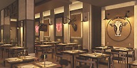 Hotel Riu Jalisco restaurant set for a destination wedding, with animal head decor and elegant tables.