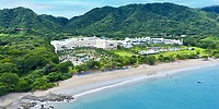 Hotel Riu Guanacaste: ideal destination wedding spot with beachfront views, lush greenery, and mountains.