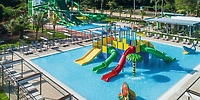 Hotel Riu Guanacaste, a popular destination wedding venue, offers a vibrant water play structure with slides in a shallow pool—perfect for entertaining younger guests during your wedding celebration.