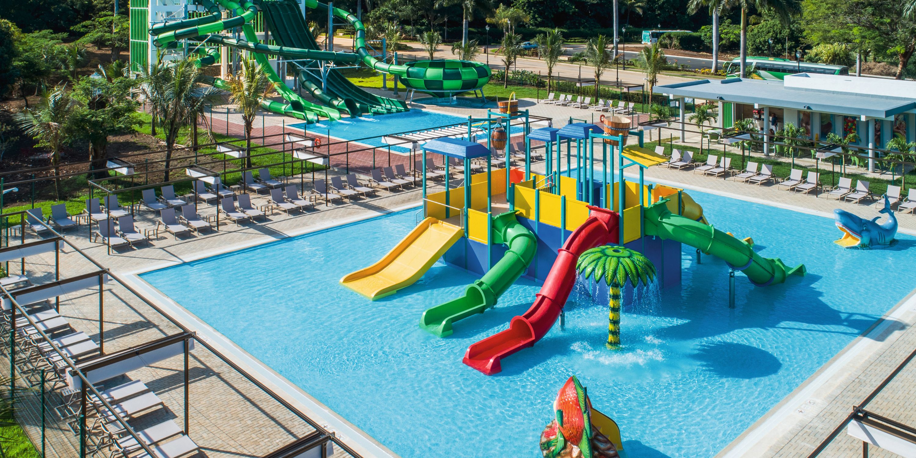 Hotel Riu Guanacaste, a popular destination wedding venue, offers a vibrant water play structure with slides in a shallow pool—perfect for entertaining younger guests during your wedding celebration.