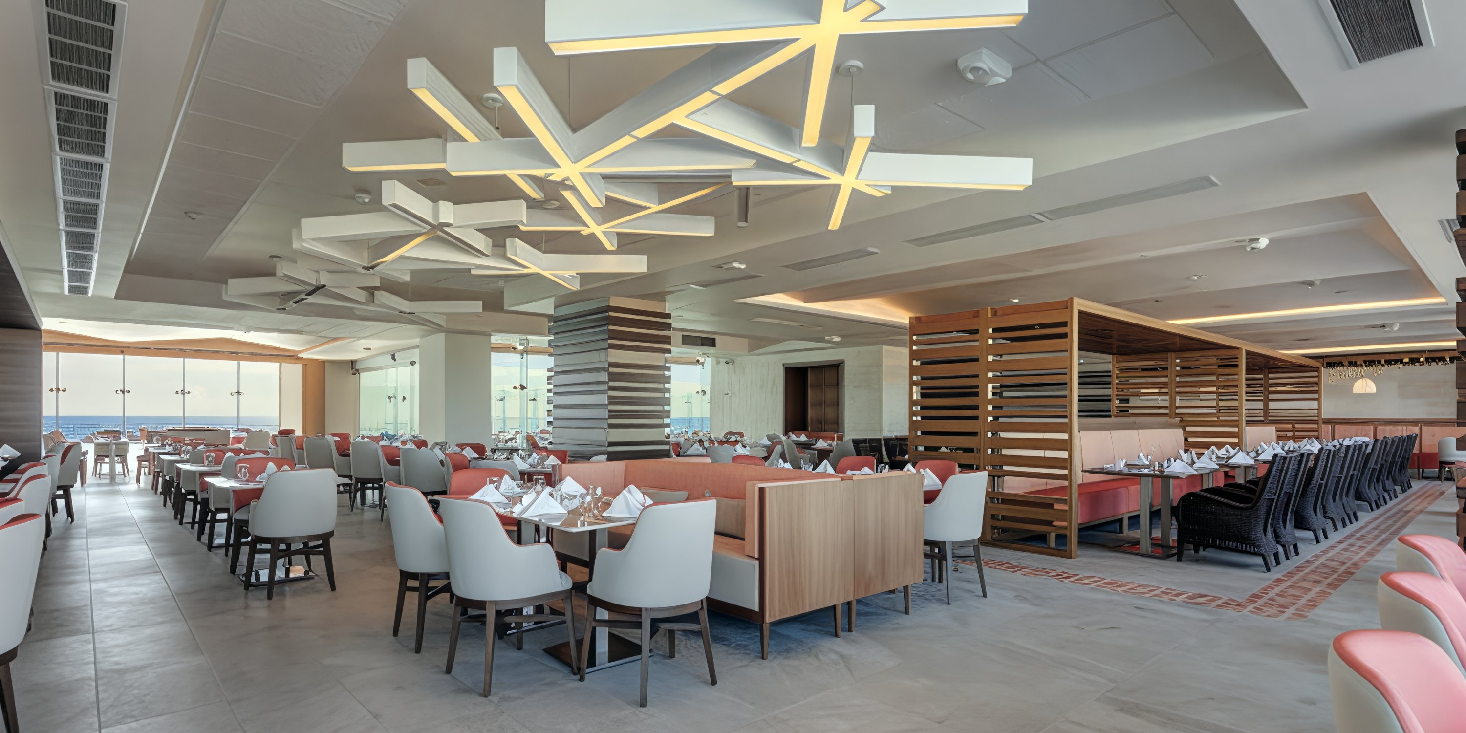 Elegant restaurant at Royalton CHIC Suites Cancun, perfect for a destination wedding, with chic lighting.