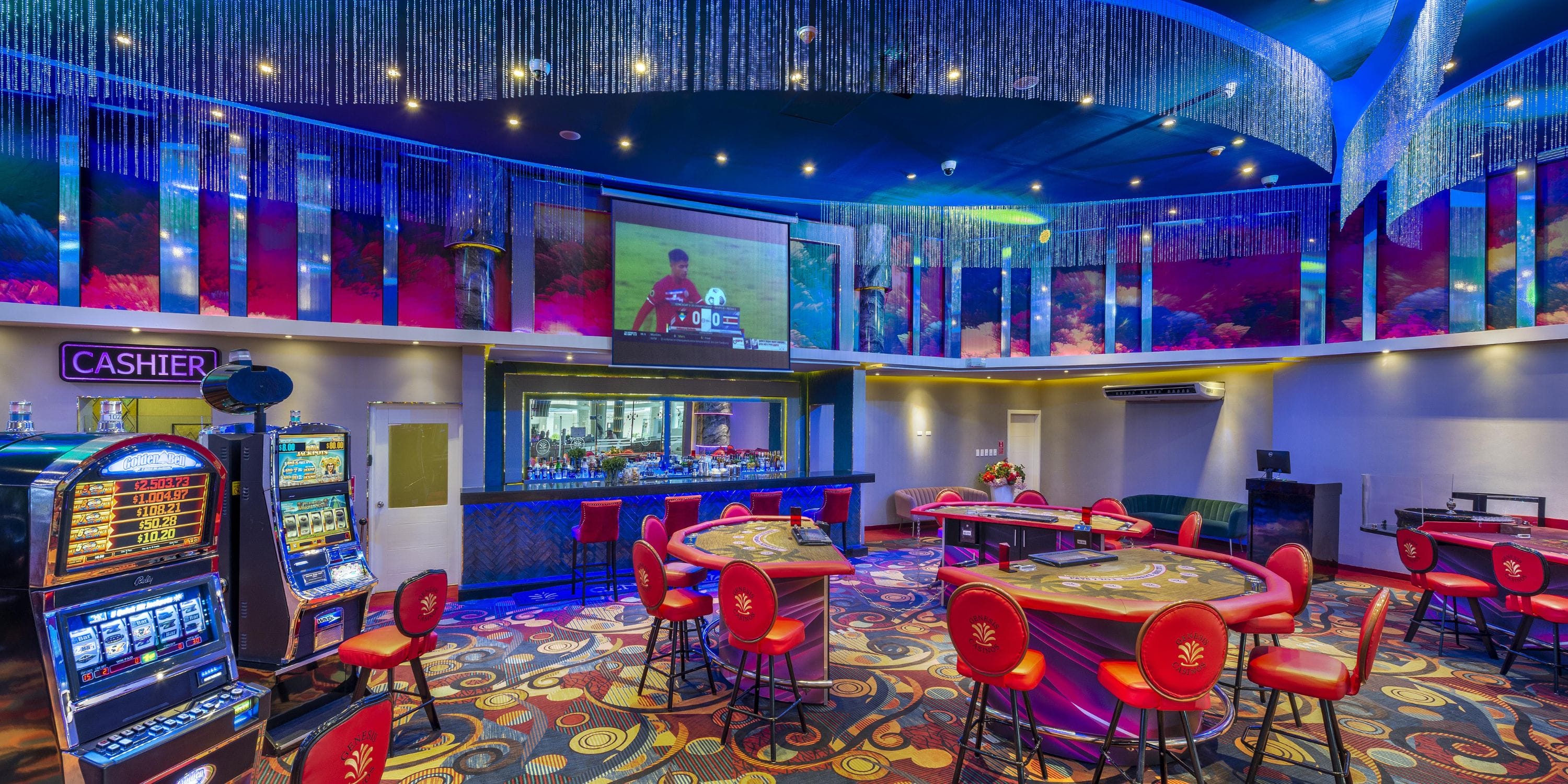 Royalton CHIC Punta Cana casino&mdash;ideal for destination weddings, with gaming tables and red chairs.