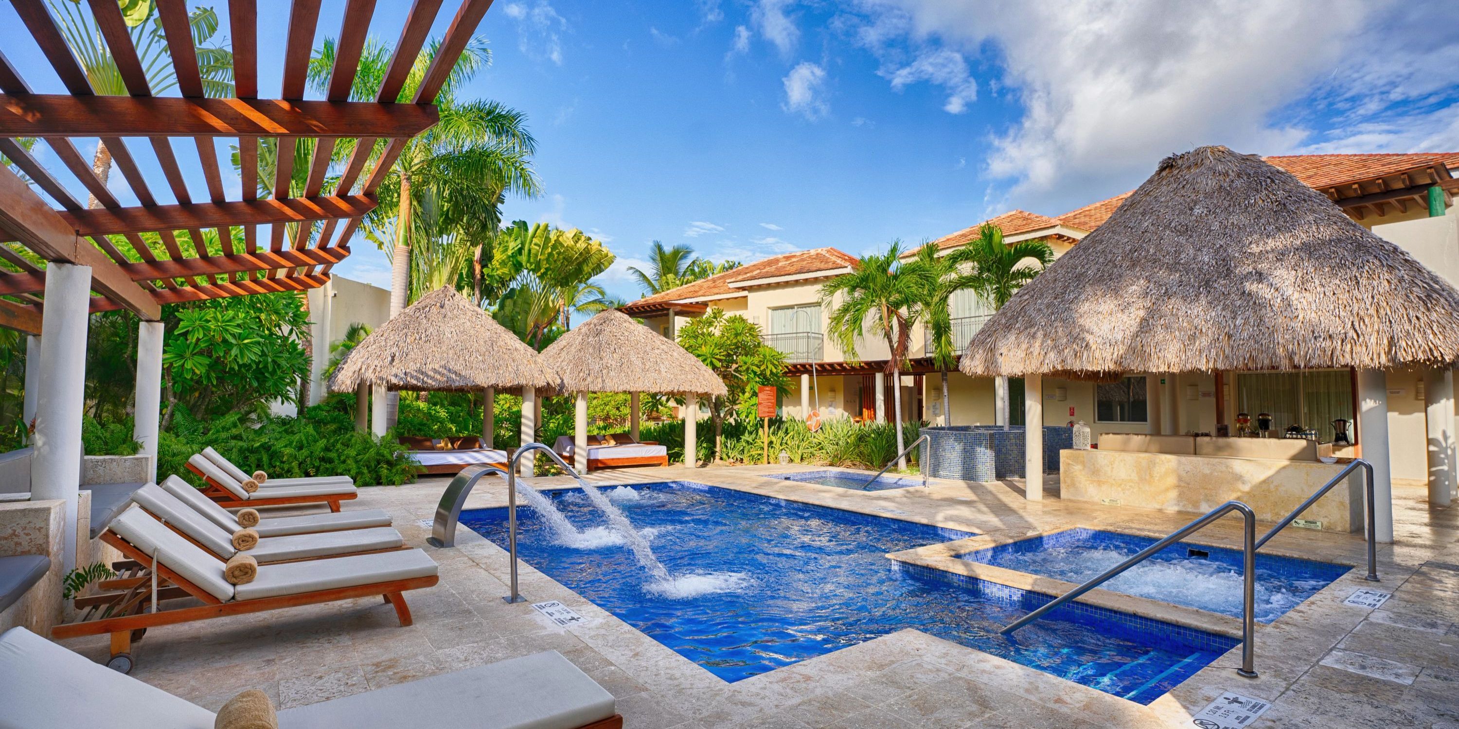 Secrets Royal Beach is ideal for a destination wedding, with an outdoor pool, cabanas, and swim-up bar.