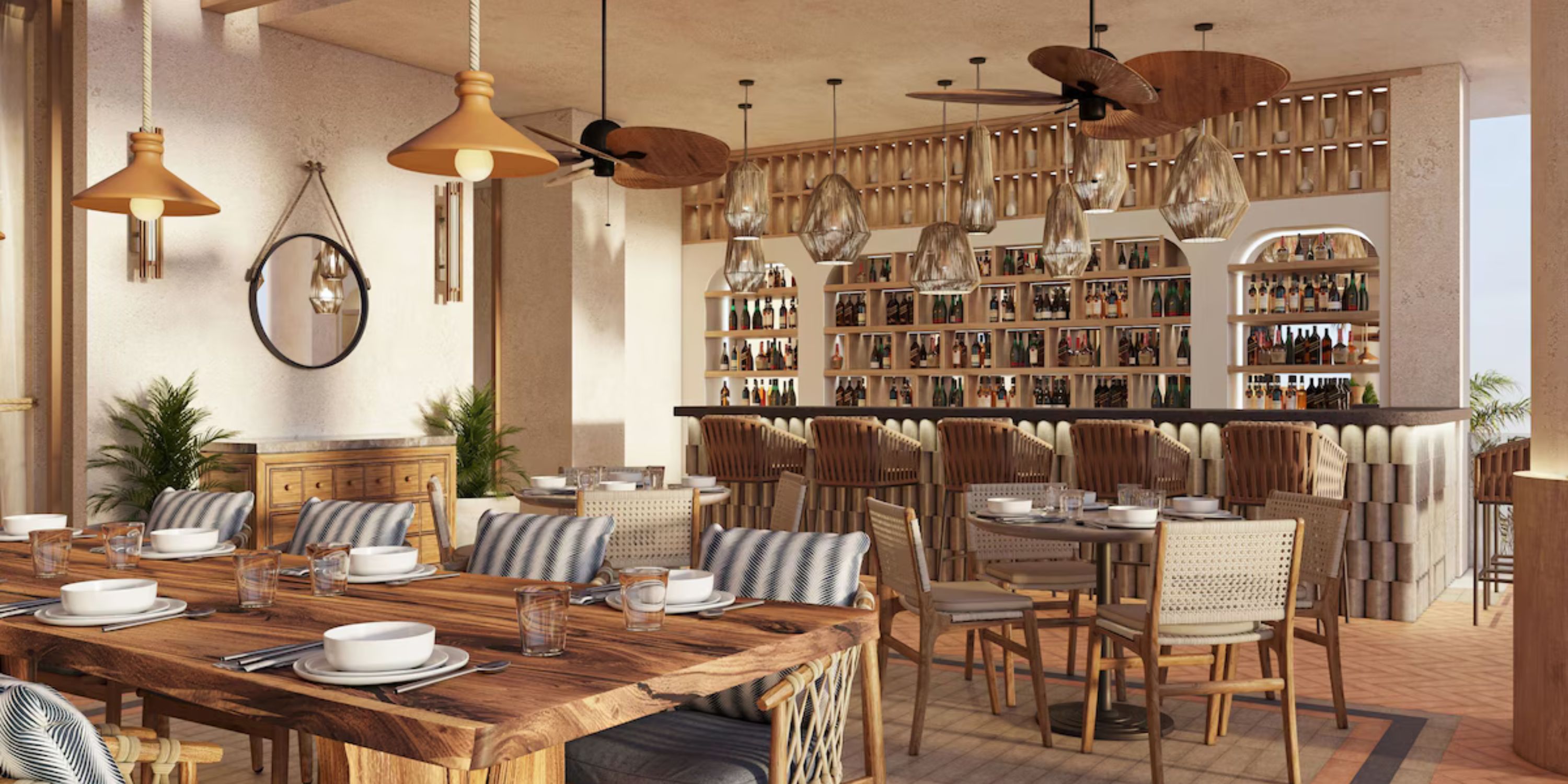 Chic Secrets Playa Mujeres: ideal for a destination wedding with wooden tables, cushioned chairs, and bar.