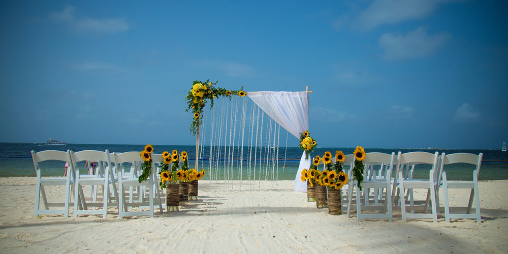 Simple beach wedding and canopy at Dreams Palm Beach Punta Cana Dominican Republic