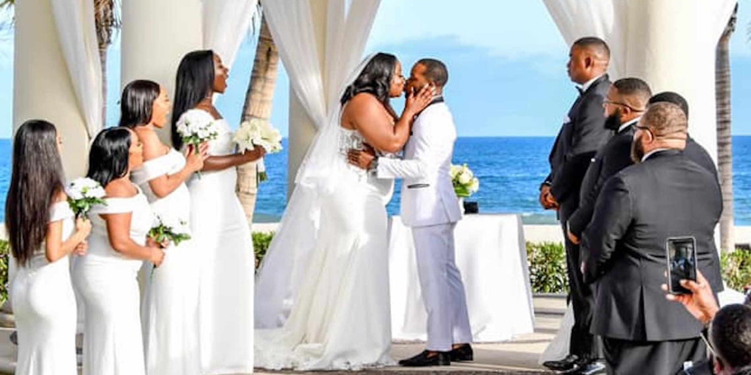 Imani and Walter kiss and are married