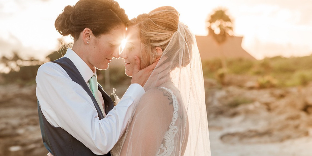 Tiana and Jessica embrace during the sunset