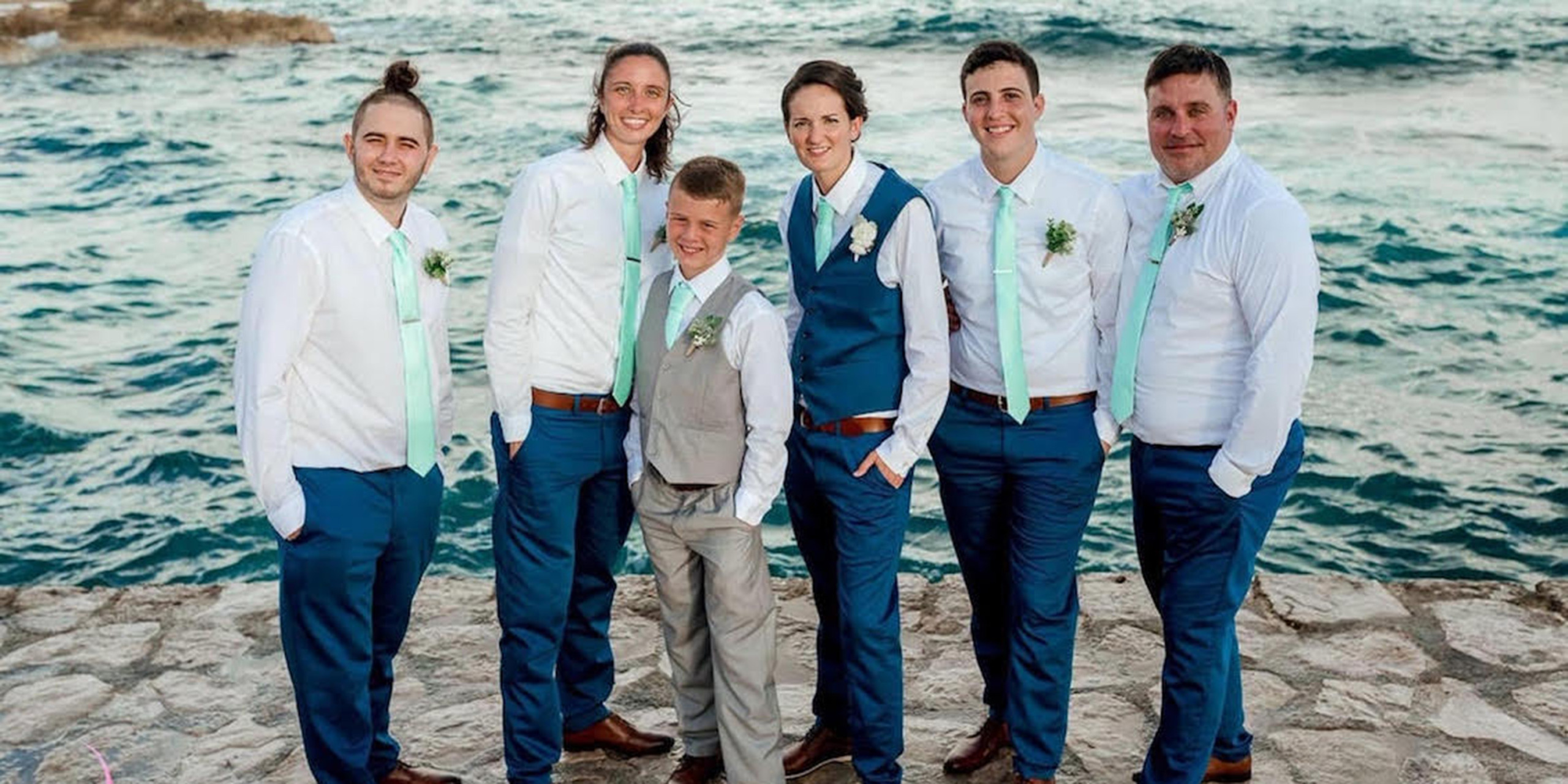 Tiana and Jessica pose with their wedding party