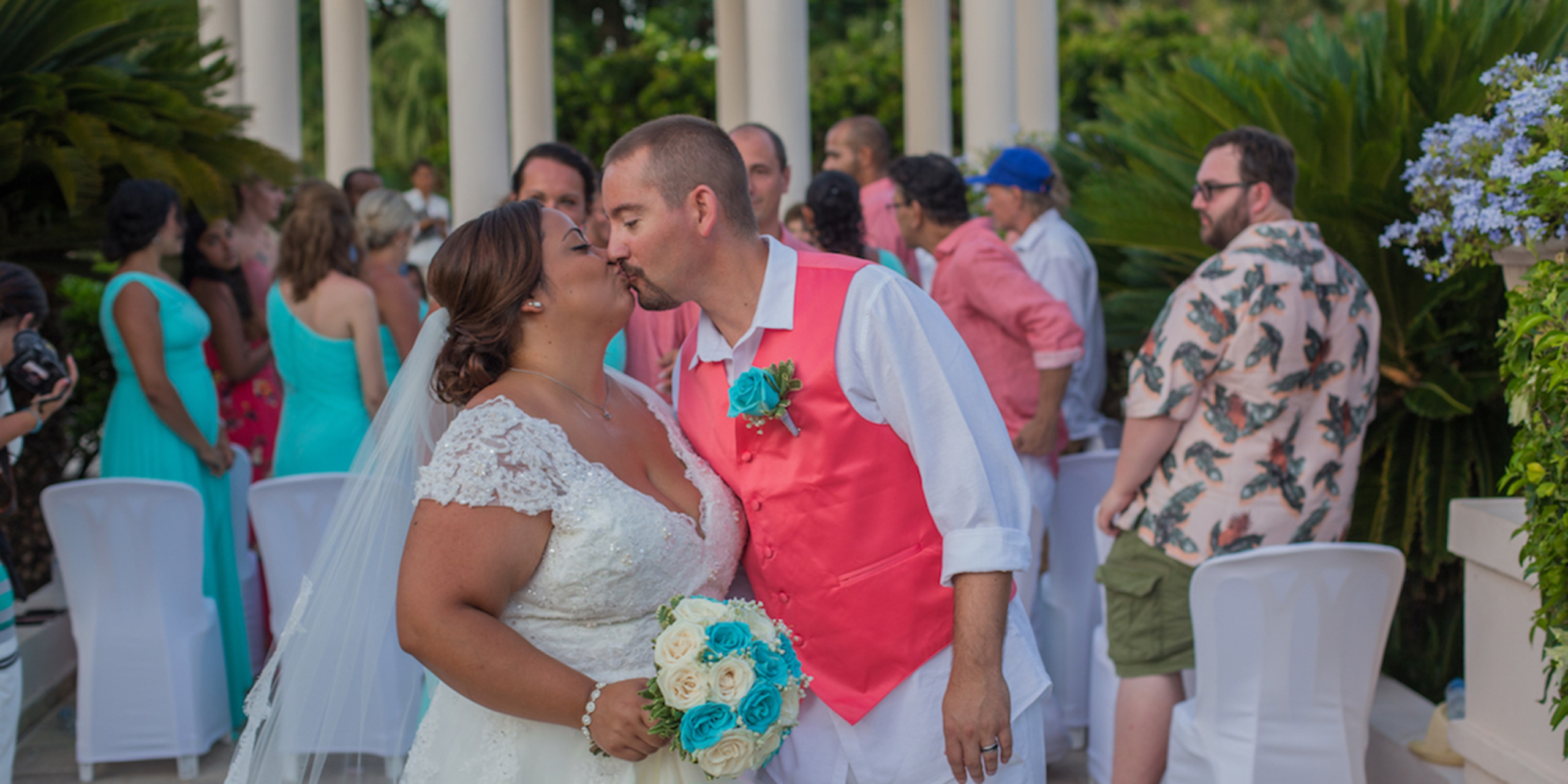 Newlyweds Yolanda and Brett kiss after getting married at a destination wedding thanks to Destify.