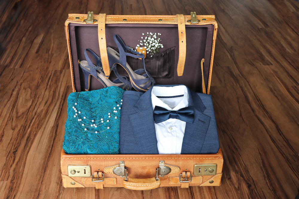 Packed suitcase - ready for a wedding trip