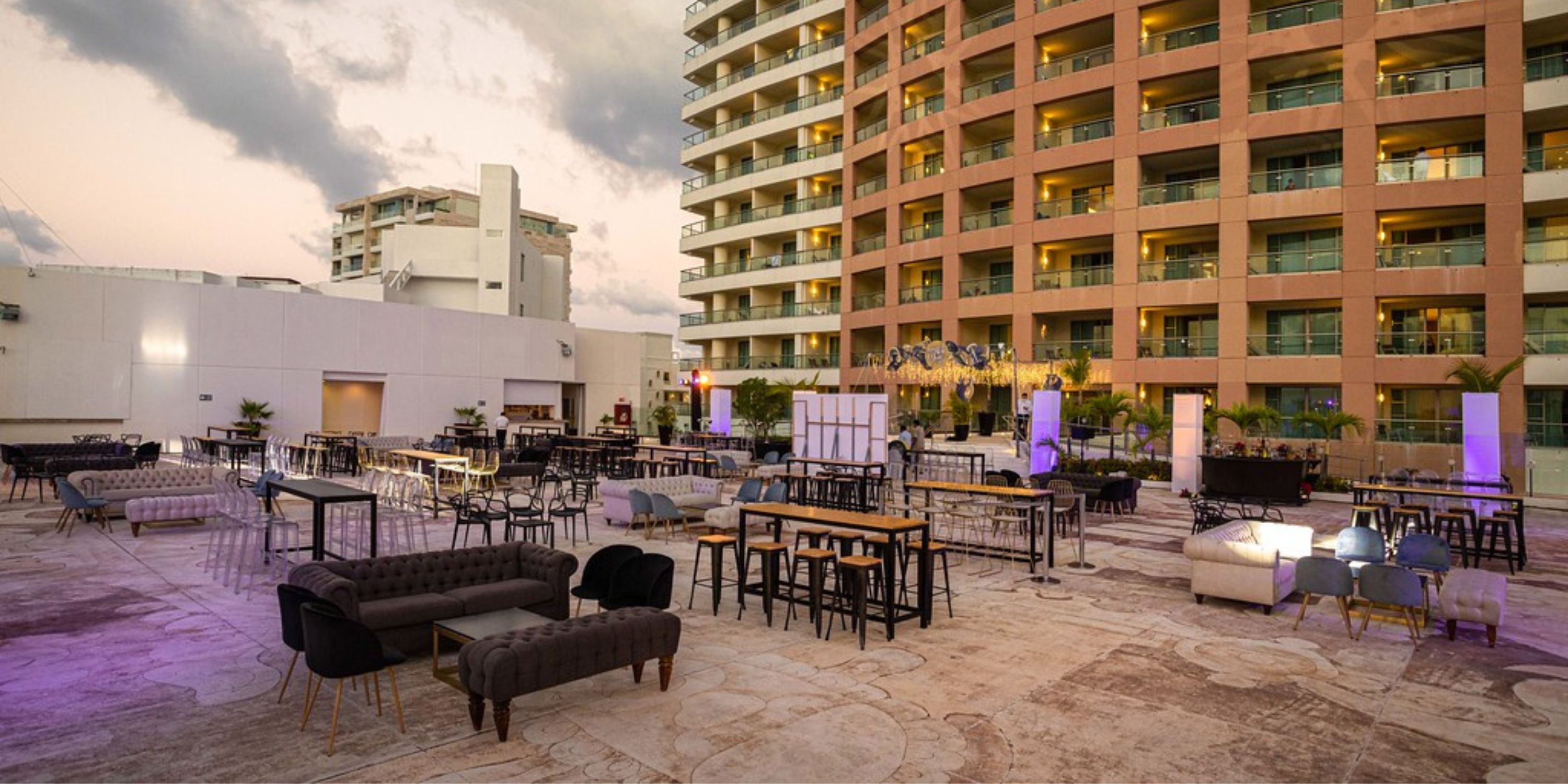 Beach Palace Cancun&rsquo;s outdoor patio, perfect for a destination wedding, offers varied seating by the hotel.