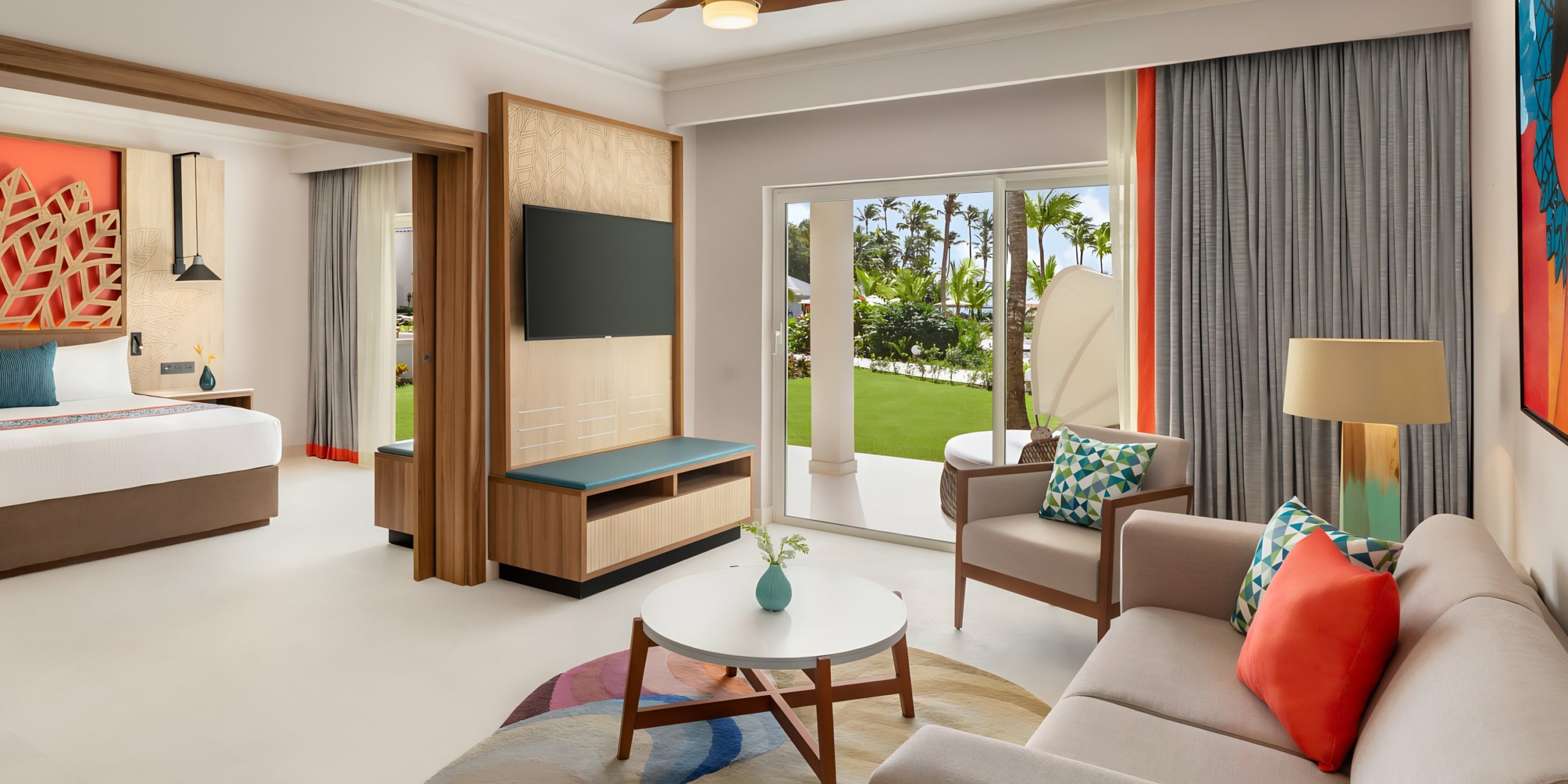 Bright and modern Hilton La Romana (Adults Only) hotel room with tropical garden view.