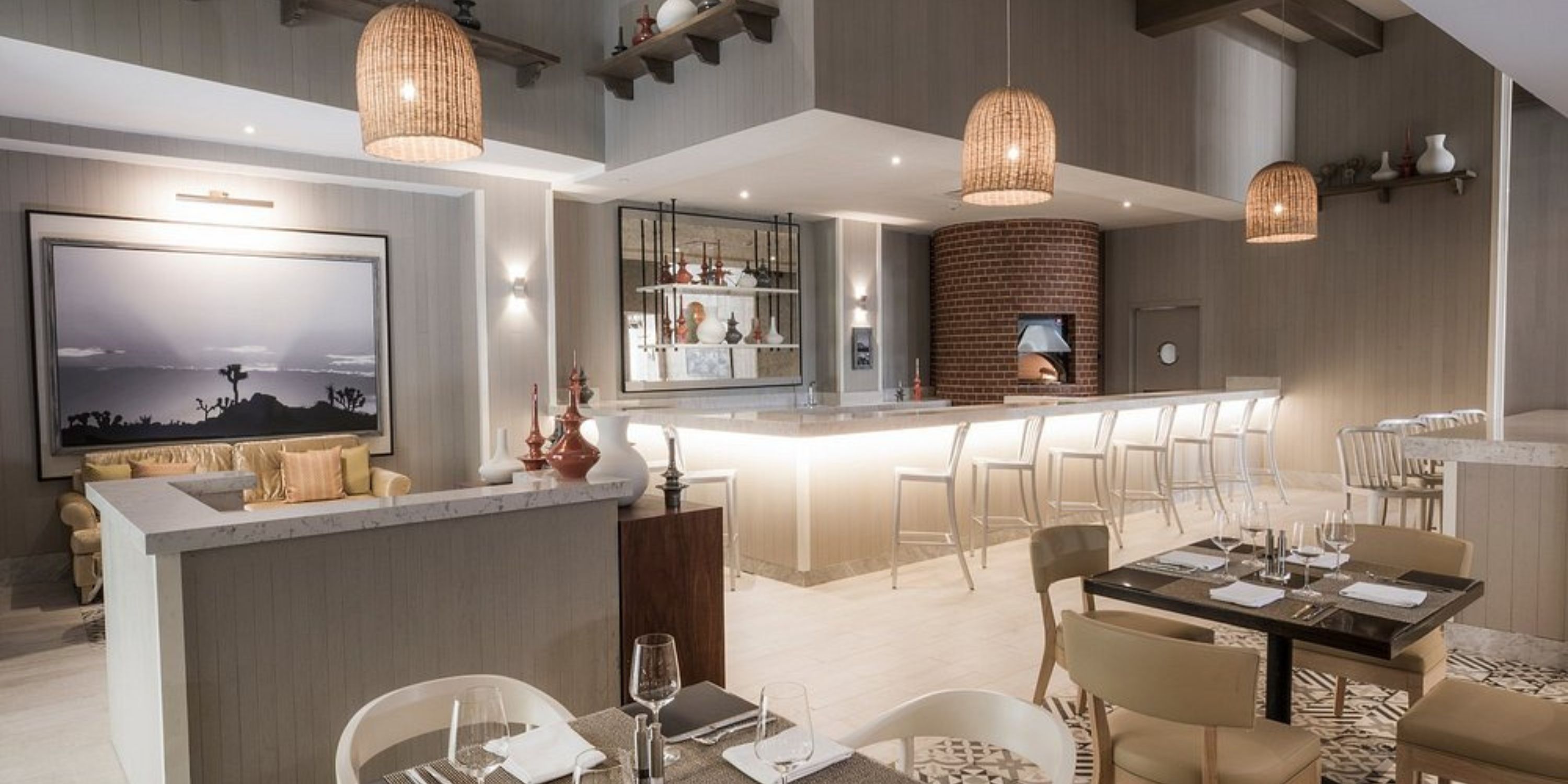 Le Blanc Spa Resort Los Cabos offers a stylish restaurant with neutral tones, ideal for destination weddings.