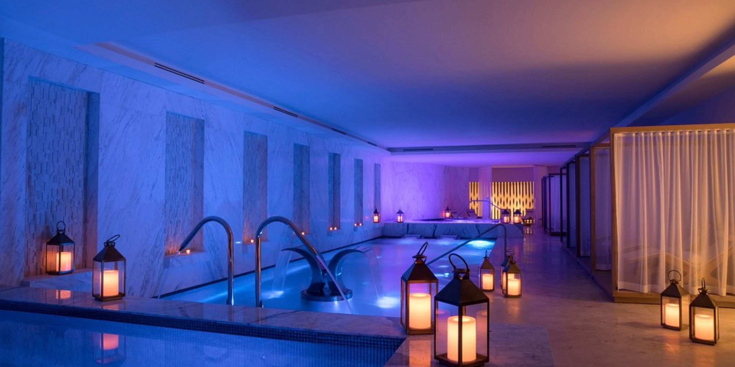 Le Blanc Spa Resort Los Cabos offers an elegant indoor pool with marble walls, ideal for a destination wedding.