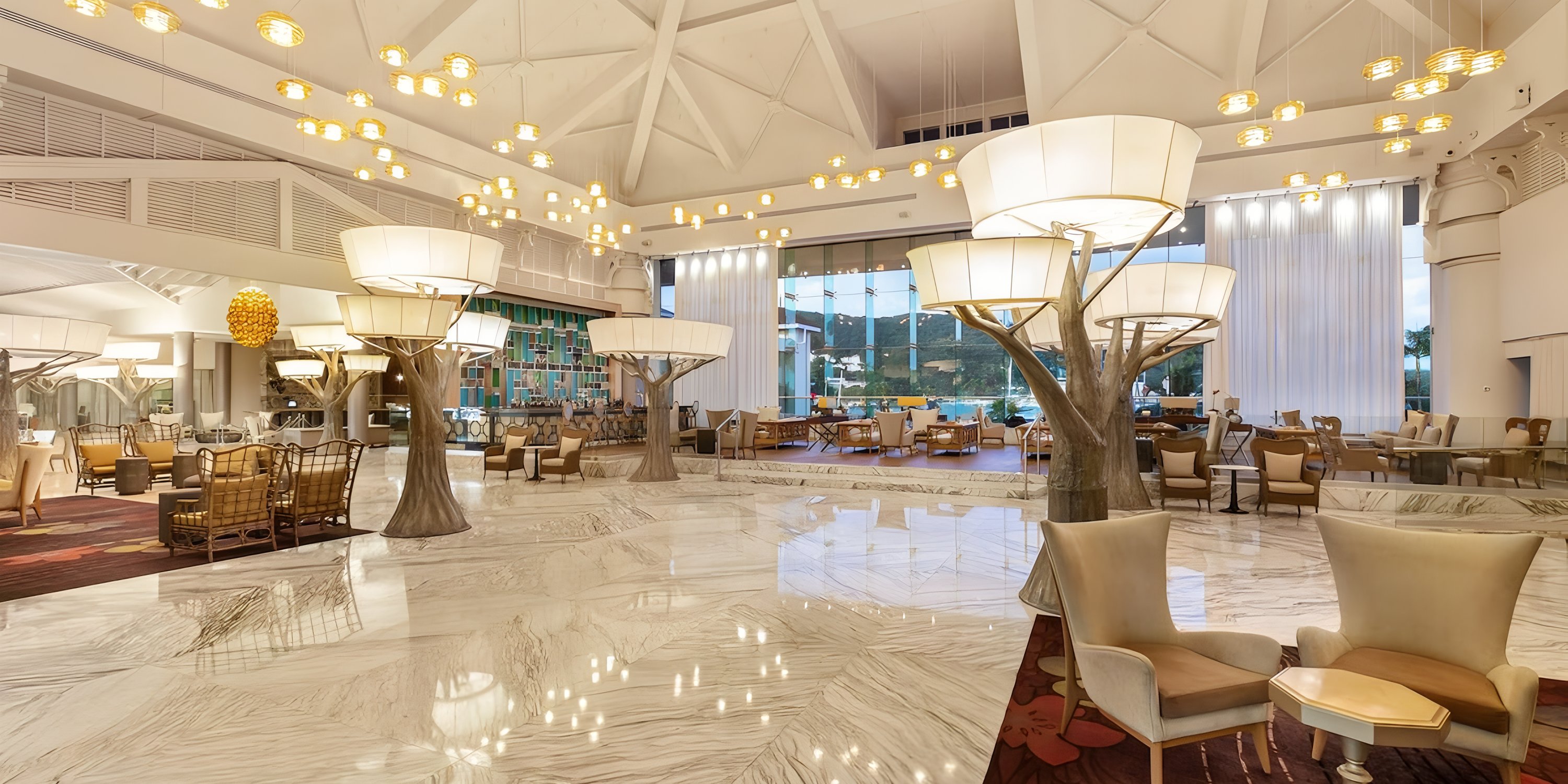 Elegant Moon Palace Jamaica lobby, ideal for destination wedding, features modern lighting and marble floors.
