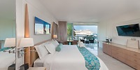Modern room at Moon Palace Jamaica: perfect for a destination wedding, with sea view and balcony.