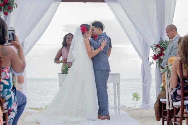 dreams dominicus la romana dominican republic lesbian wedding couple kissing at altar