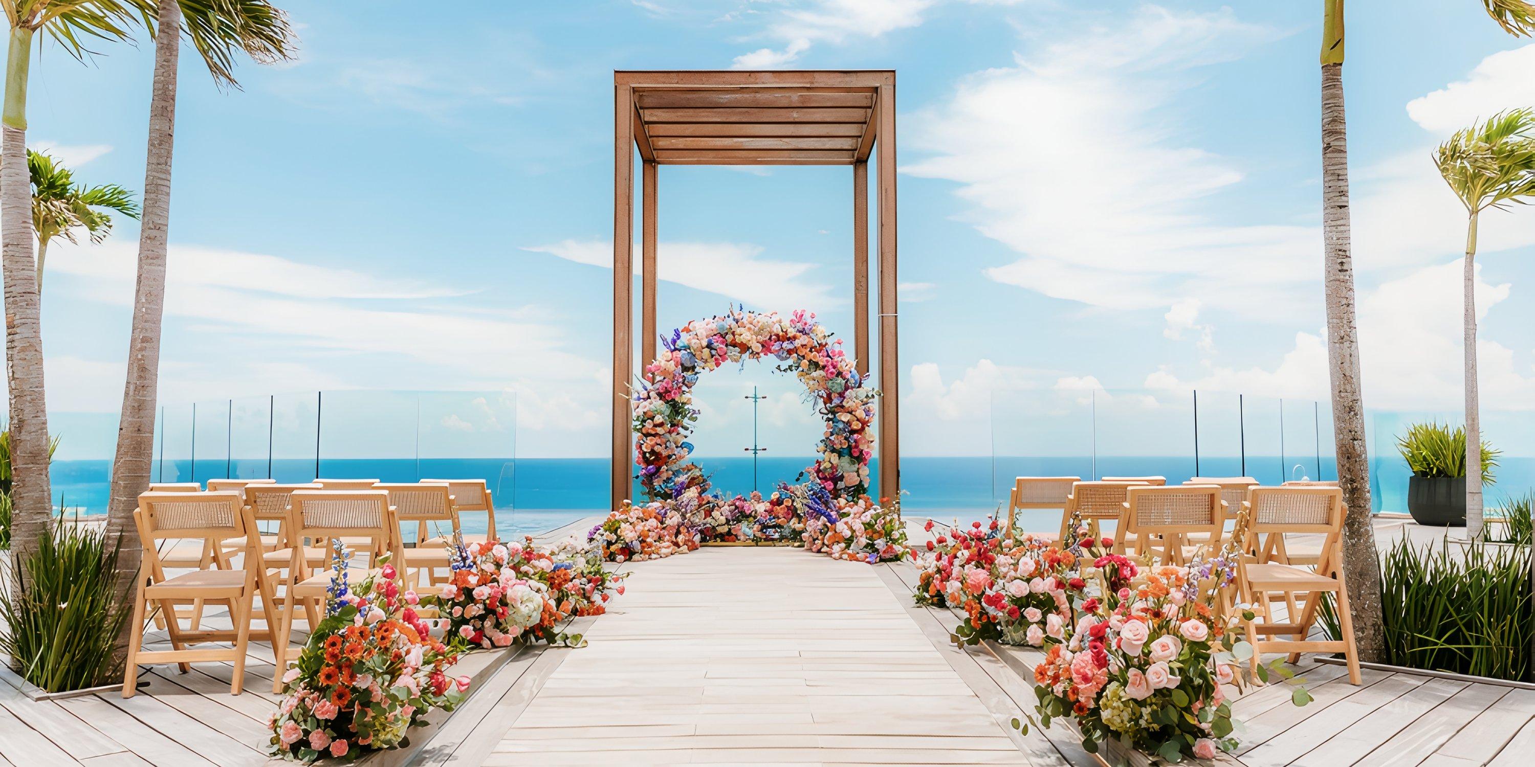 Destination wedding at Secrets Moxche Playa del Carmen with wooden altar, floral arch, and ocean backdrop.