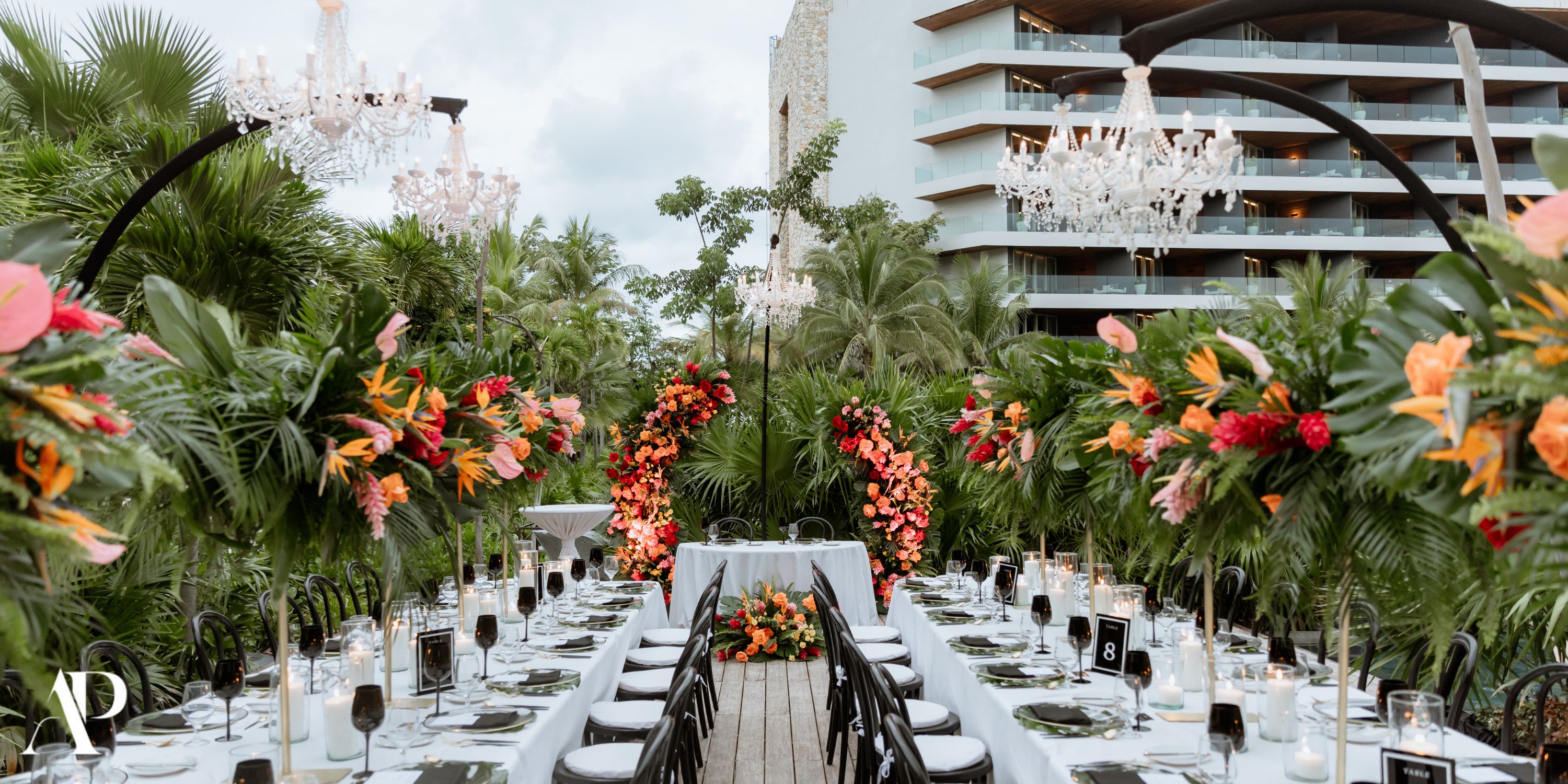 Elegant destination wedding dining at Secrets Moxche Playa del Carmen with white linens and chandeliers.