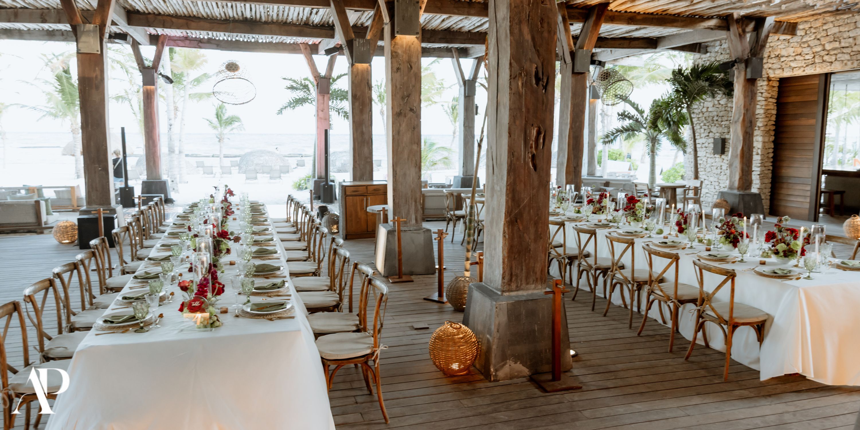 Two banquet tables elegantly arranged for a destination wedding at Secrets Moxche Playa del Carmen.