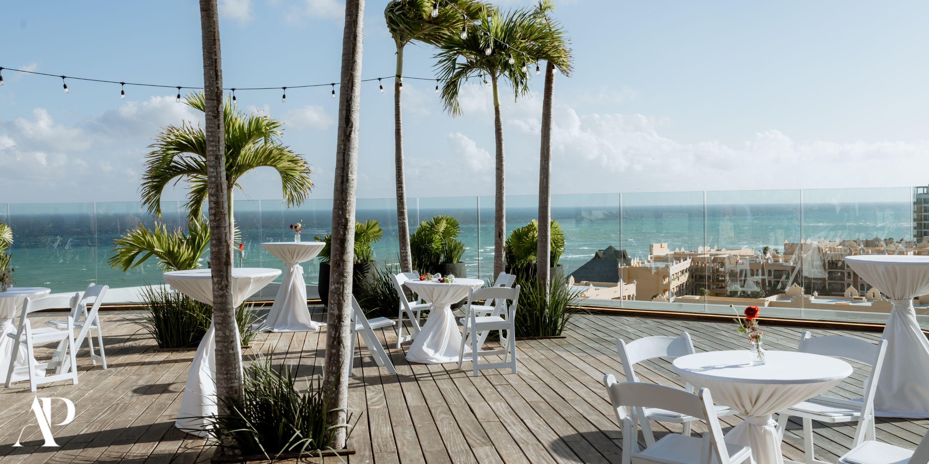 Rooftop deck at Secrets Moxche Playa del Carmen set for a destination wedding with ocean views.