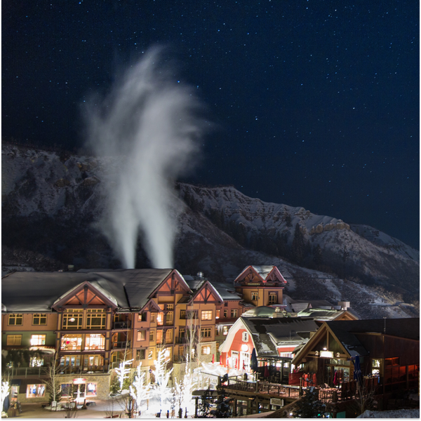 Vail Colorado downtown at night with steam and smoke and the rockies 5 Amazing Things To Do in Vail, CO